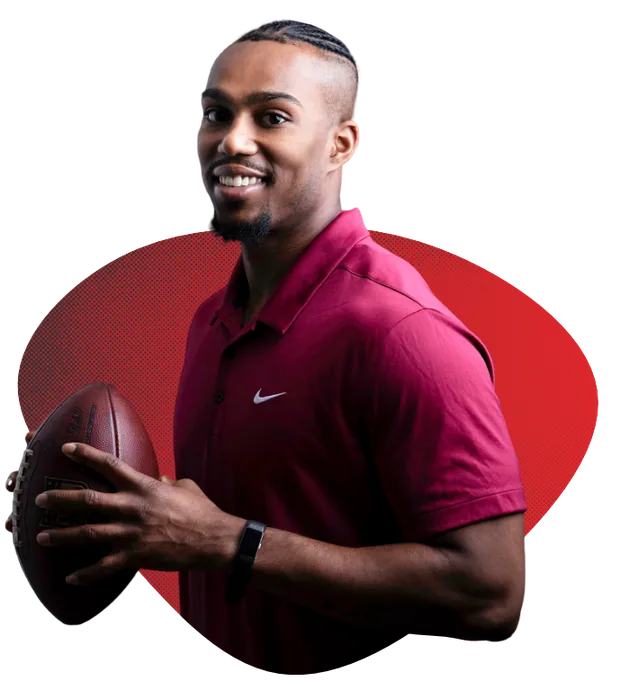 Justin Brown holding a football